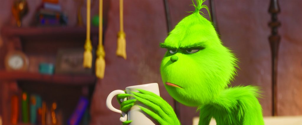 The Grinch frowning about Christmas in The Grinch