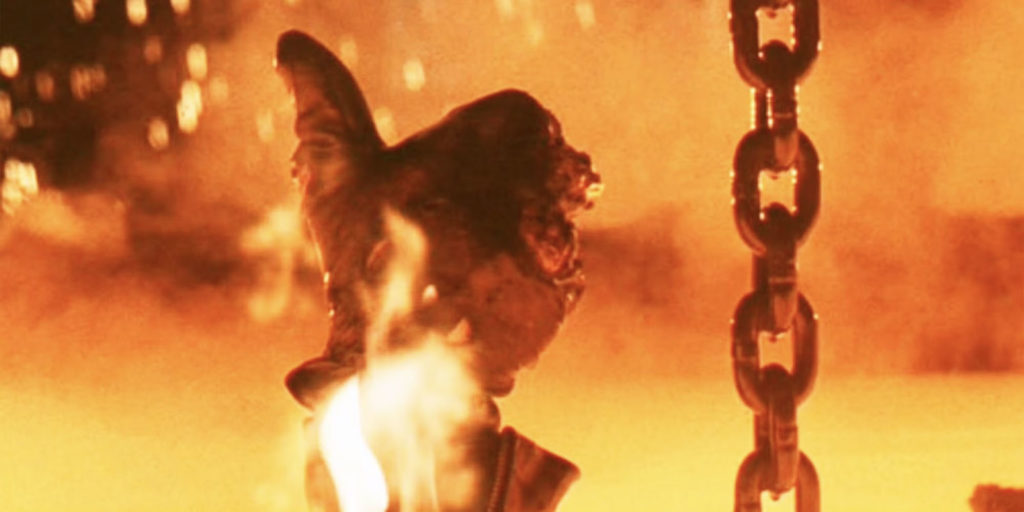 The T-800 gives a thumbs-up while lowering into molten steel in Terminator 2: Judgment Day (1991)
