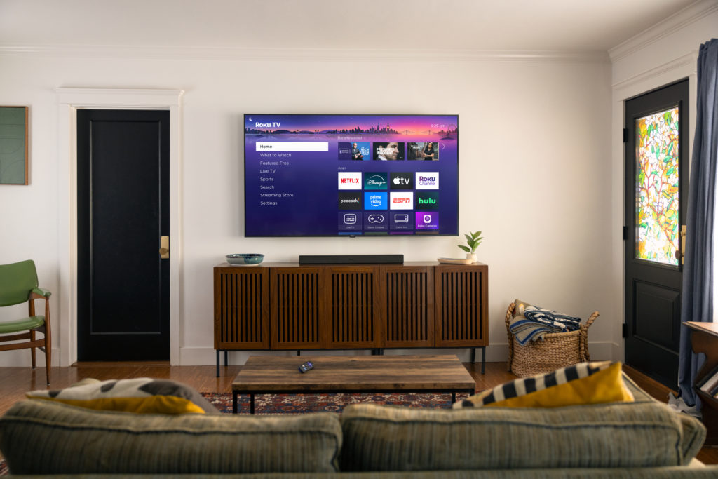 Roku 2025 Plus-Series wall-mounted in a modern living room