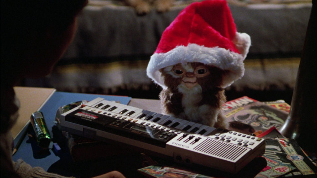 Cult Classic Christmas Movies - Gizmo in a Santa hat from Gremlins