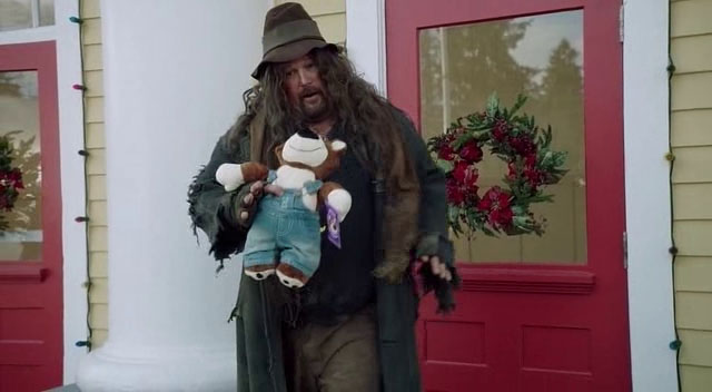 Larry the Cable Guy with a toy bear in Jingle All the Way 2