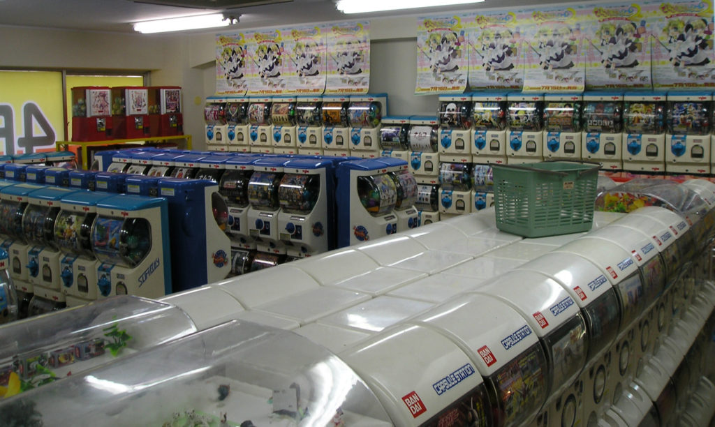 Rows of gachapon capsule toy machines in Japan