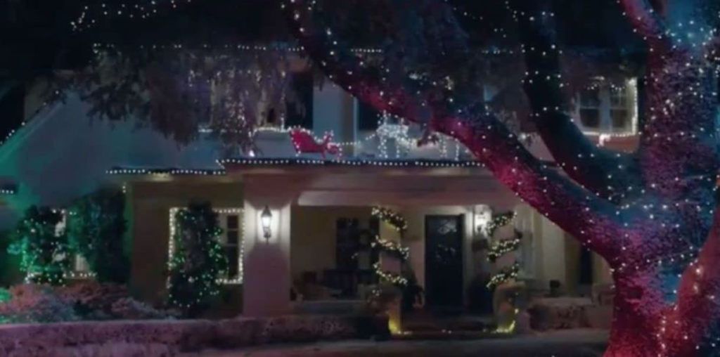 Suburban house lit for Christmas in Better Watch Out.