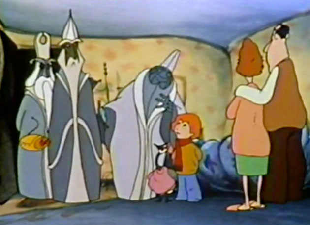 Three aliens talking to a child in A Cosmic Christmas