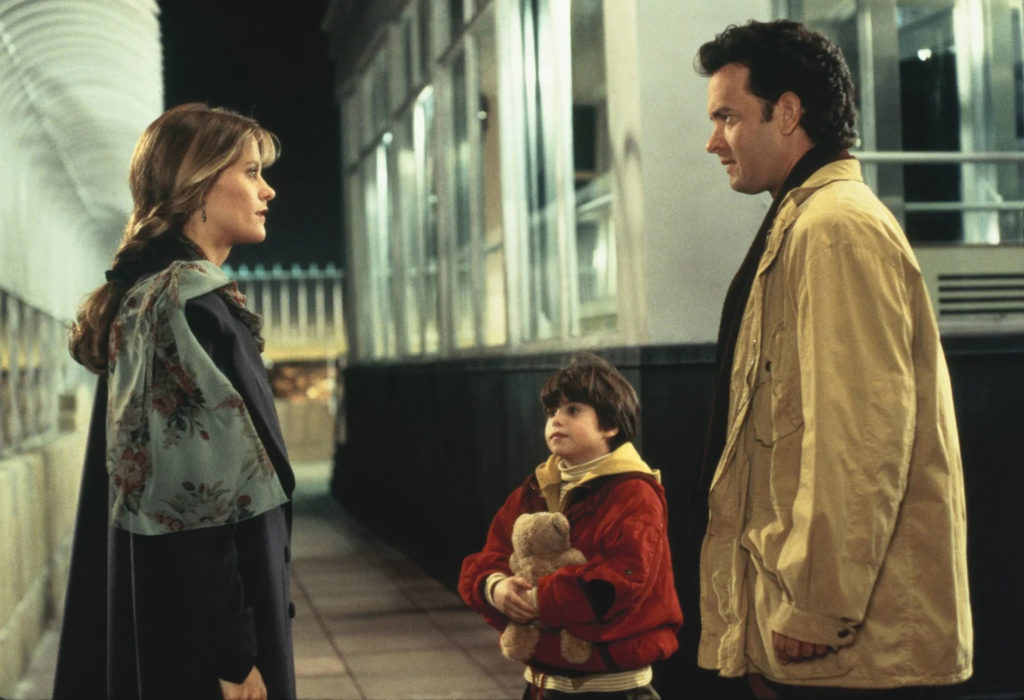 Best Romantic Comedies of 1990s - Tom Hanks and Meg Ryan at the top of the Empire State Building in Sleepless in Seattle