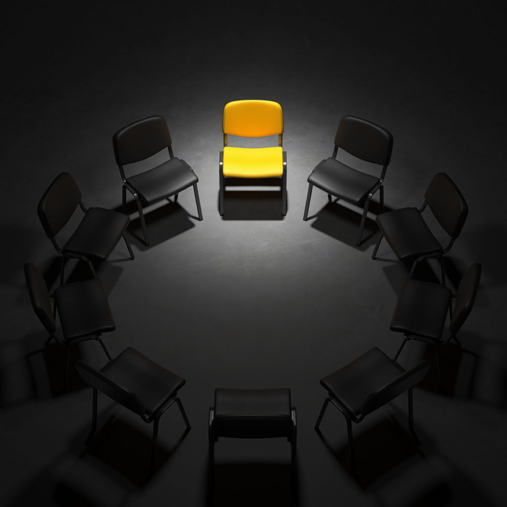 How to Play Werewolf - Empty chairs arranged for a Werewolf game