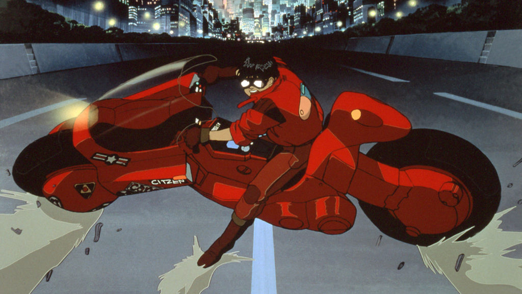 Kaneda riding his motorcycle through Neo-Tokyo in Akira (1988)