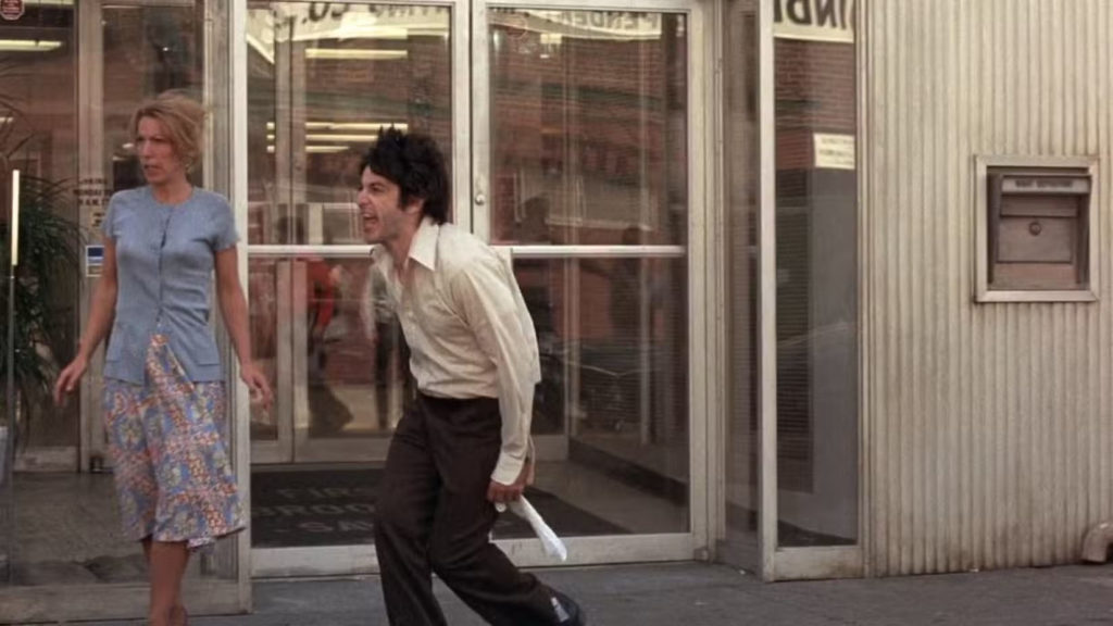 Al Pacino speaking to the crowd outside the bank in Dog Day Afternoon