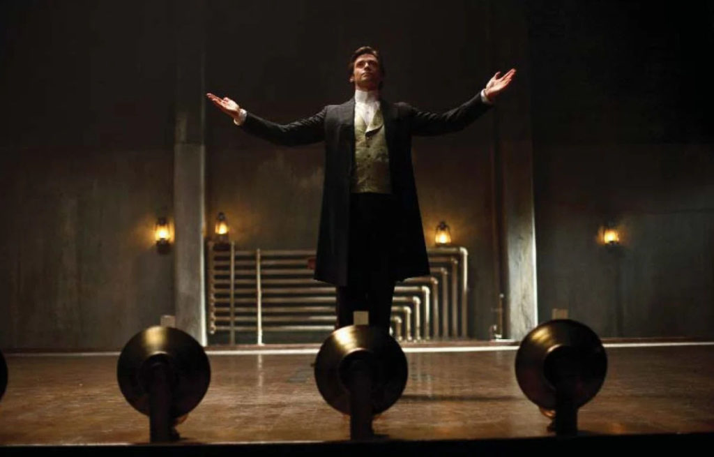 Underrated 2000s Movies - A magician performing an illusion on stage in The Prestige