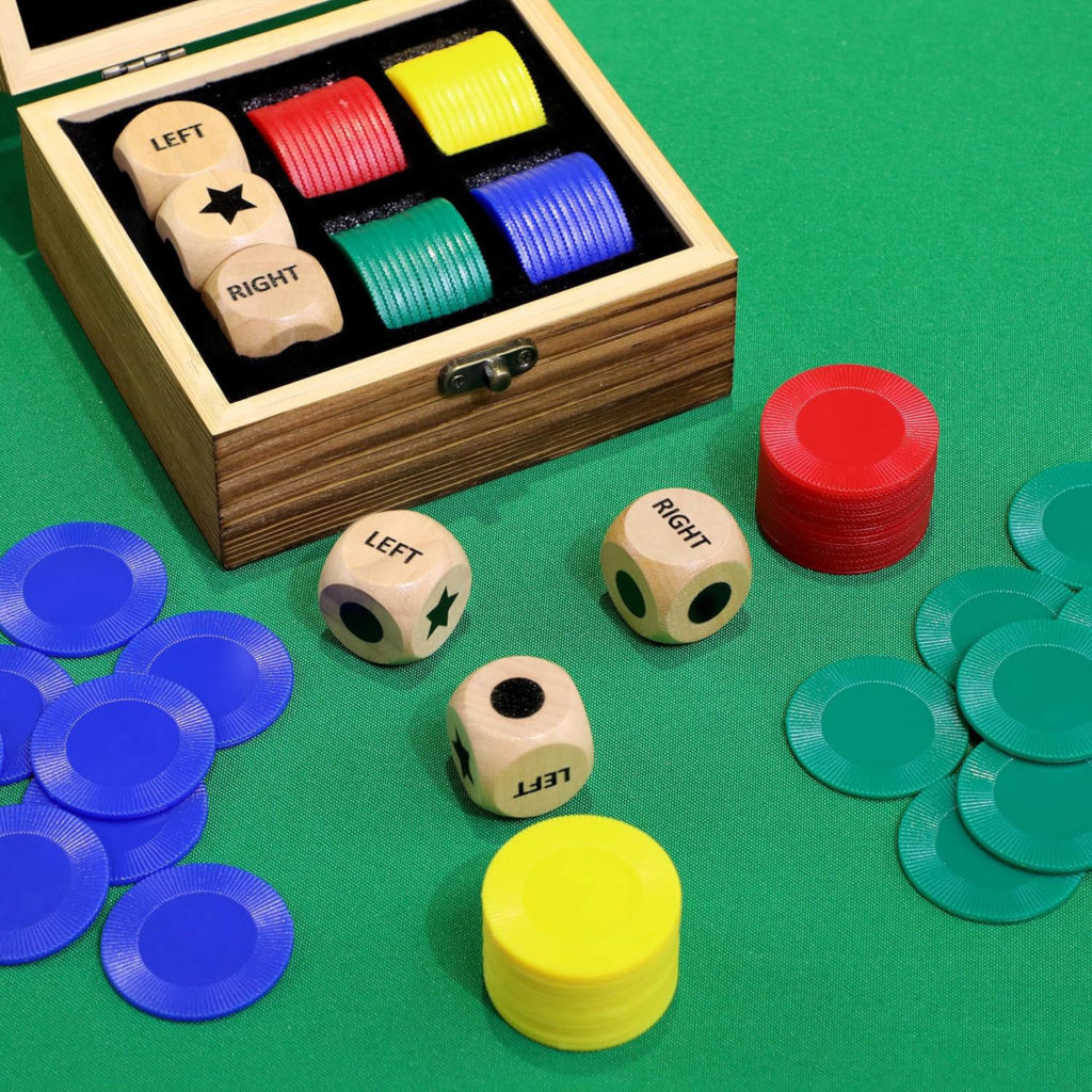 How to Play LCR - An LCR set including dice and chips