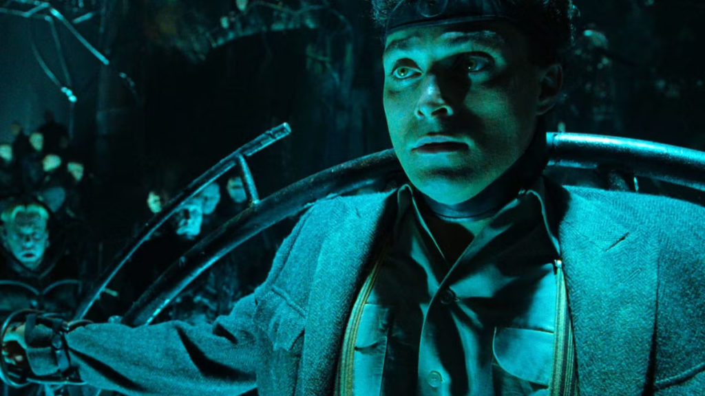 Rufus Sewell in a night-time cityscape from Dark City (1998)