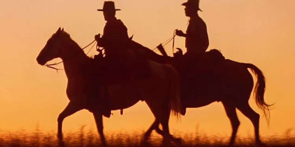 The Rise and Fall of the Hollywood Western - Silhouetted rider at sunset in Unforgiven
