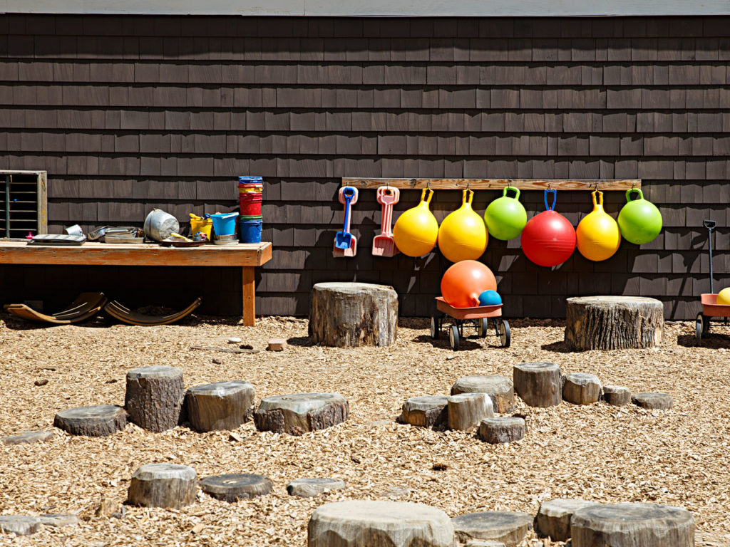 How to Keep Kids Entertained All Summer Without Screens - Backyard space ready for kids outdoor games