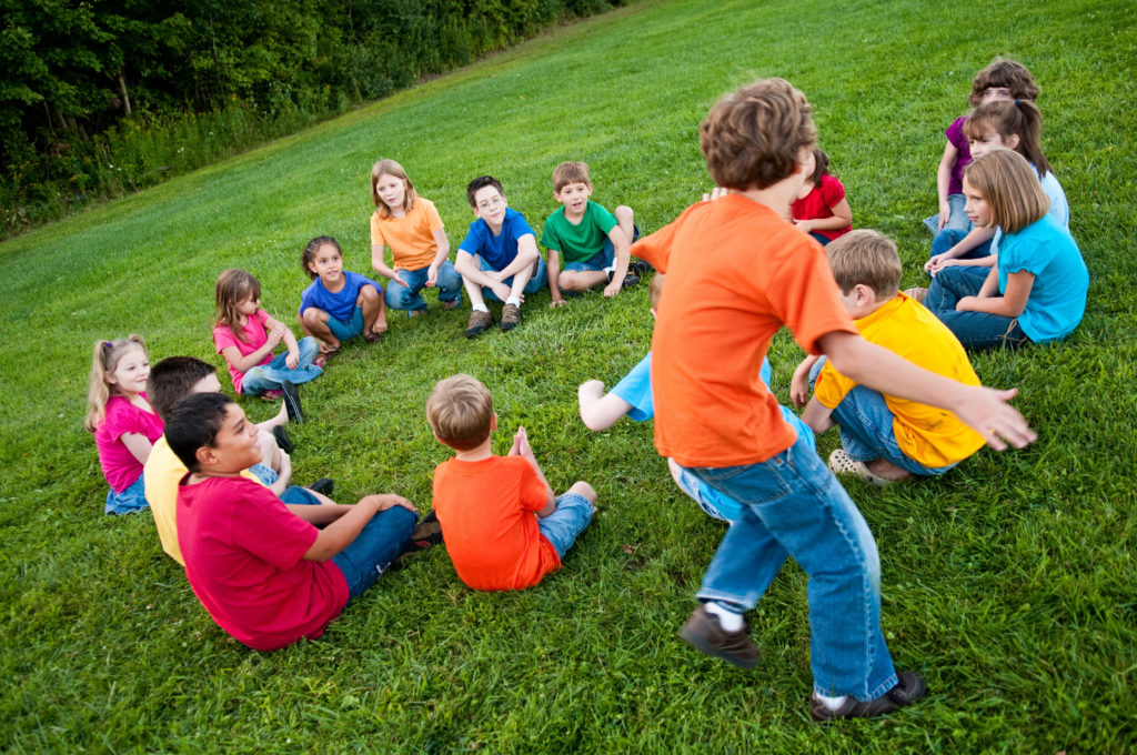 How to Play Duck Duck Goose - Picker choosing the Goose in Duck Duck Goose